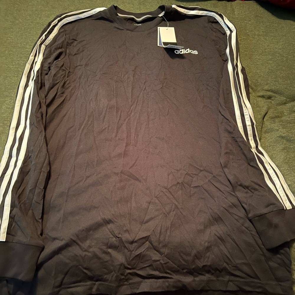New Woman’s Adidas top